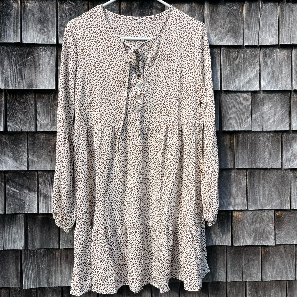 Animal print mini dress with tie and ruffle tiers